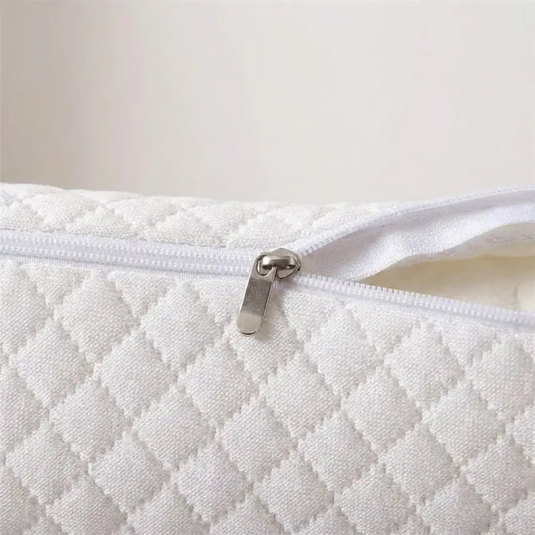 Närbild på HappySleep-kuddens andningsbara mesh och minnesskum